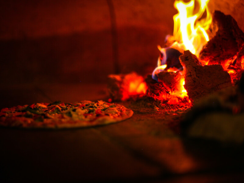 pizza in a wood fired oven